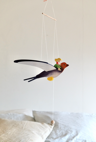 Mobile fairy child with swallow - uro