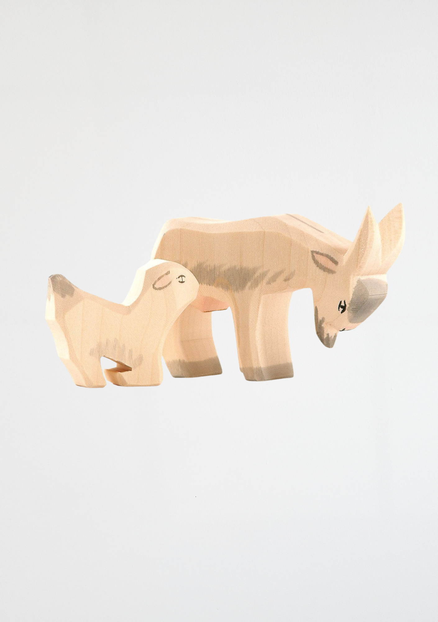 Goat kid drinking - trefigur