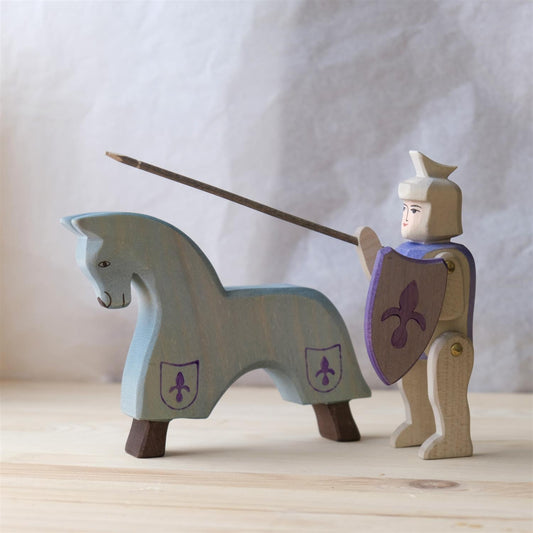 Knight riding blue with horse - trefigur