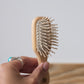 Liten hårbørste med trepigger 11 cm