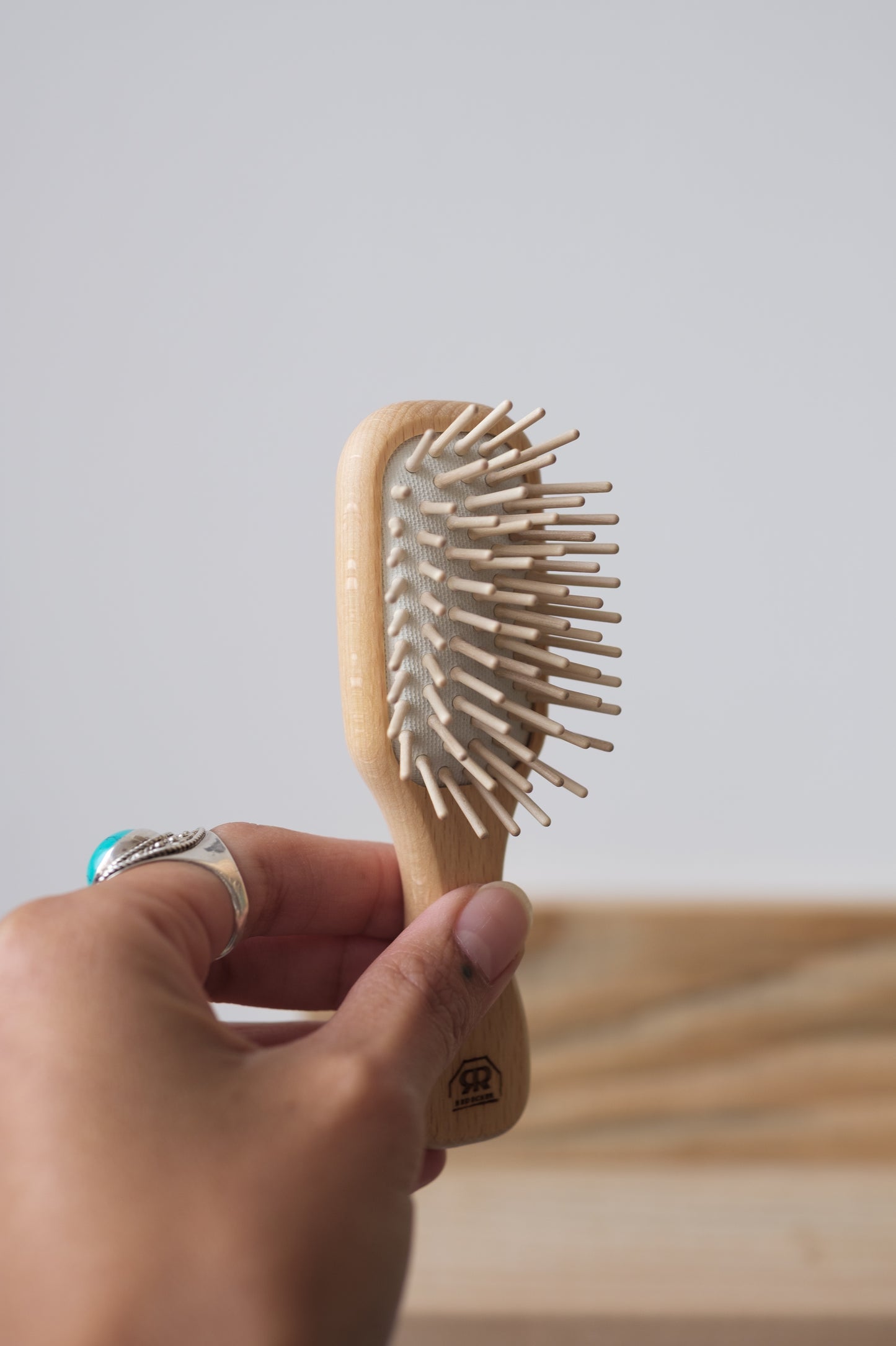 Liten hårbørste med trepigger 11 cm