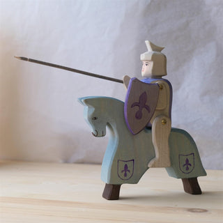 Knight riding blue with horse - trefigur