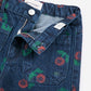 Stamp Bloom all over denim pants