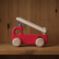 Liten brannbil med stige og bjelle