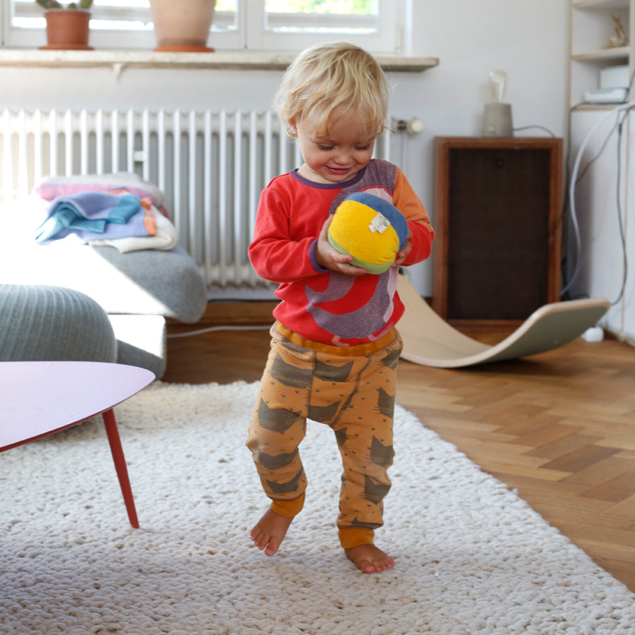 Regnbueball i frotté med bjelle - 11cm