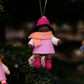 Julebarn på kjelke - jente rosa kjole - hengeullfigur