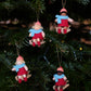 Julebarn på kjelke - jente rød kjole - hengeullfigur
