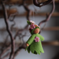 Liten blomstrende gren - hengeullfigur