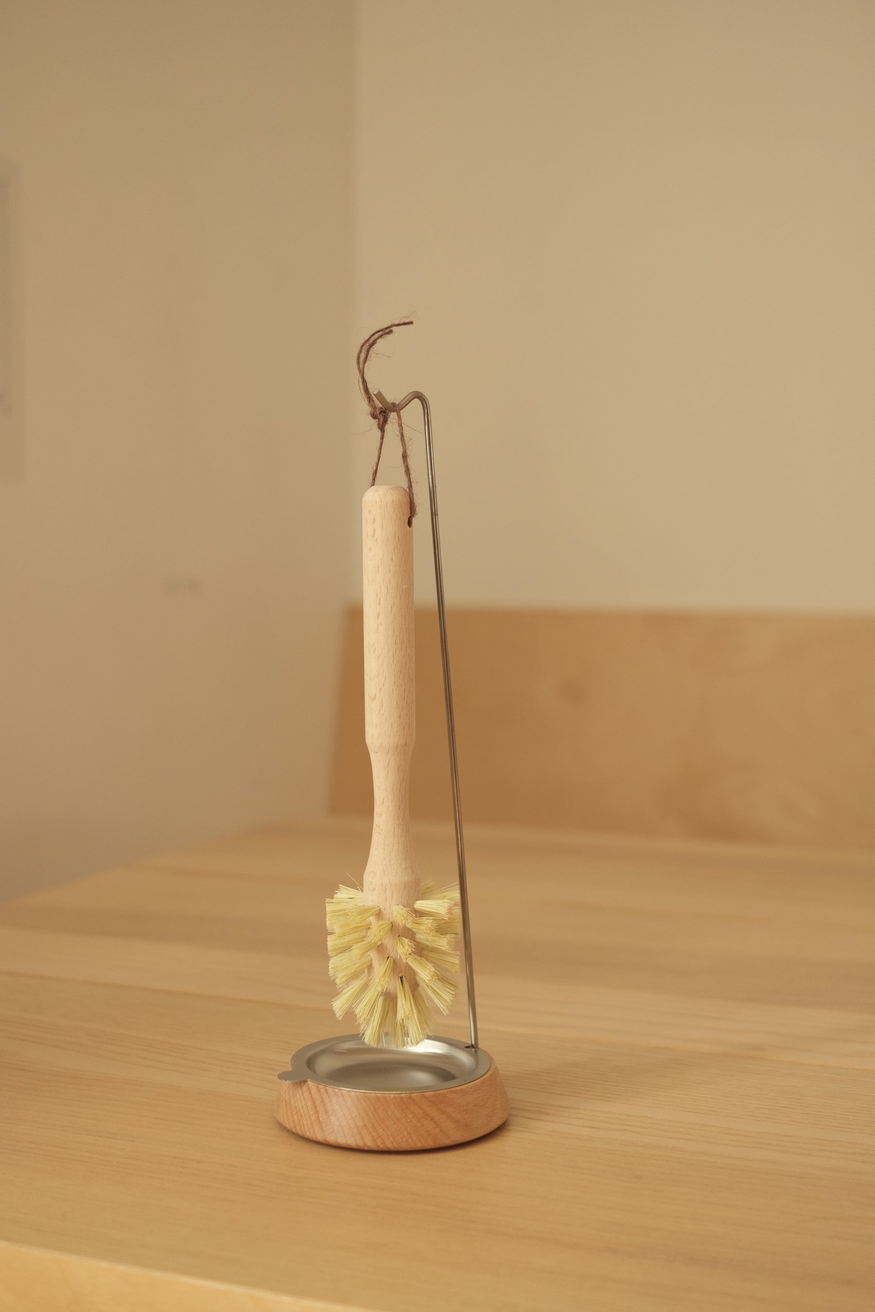 Holder til oppvaskkost