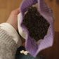 Lavendelblomster i linpose