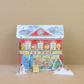 Leketøybutikk - adventskalender i papir i portrettformat